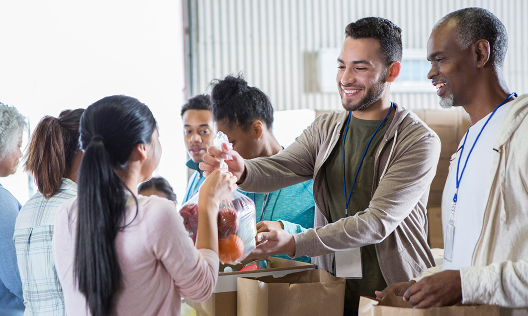 Community members distributing relief packages.